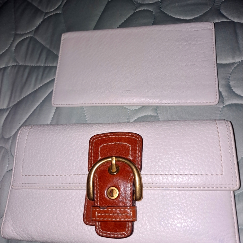 Coach trifold off white leather checkbook wallet.